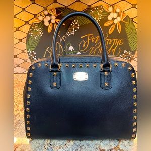 Slightly Used Purse and stored with love and care. Lining is 100%Polyester.